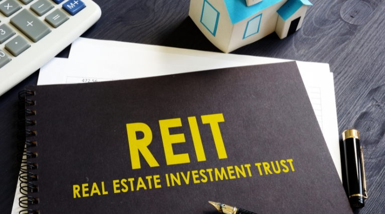 Through the Possession of Shares in Real Estate Investment Trusts
